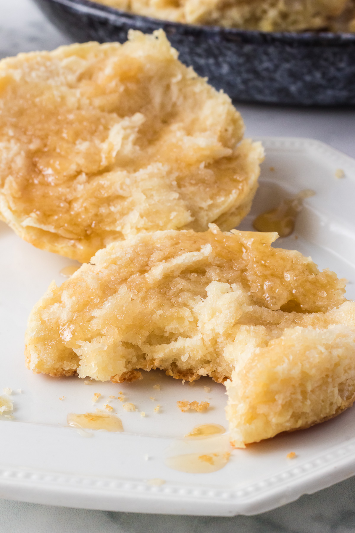 These Homemade Buttermilk Biscuits transform a few simple ingredients into flaky layers of golden deliciousness! They are the perfect base for the best biscuits and gravy, a side accompaniment to your meal, or for breakfast topped with some sweet honey. via @foodhussy