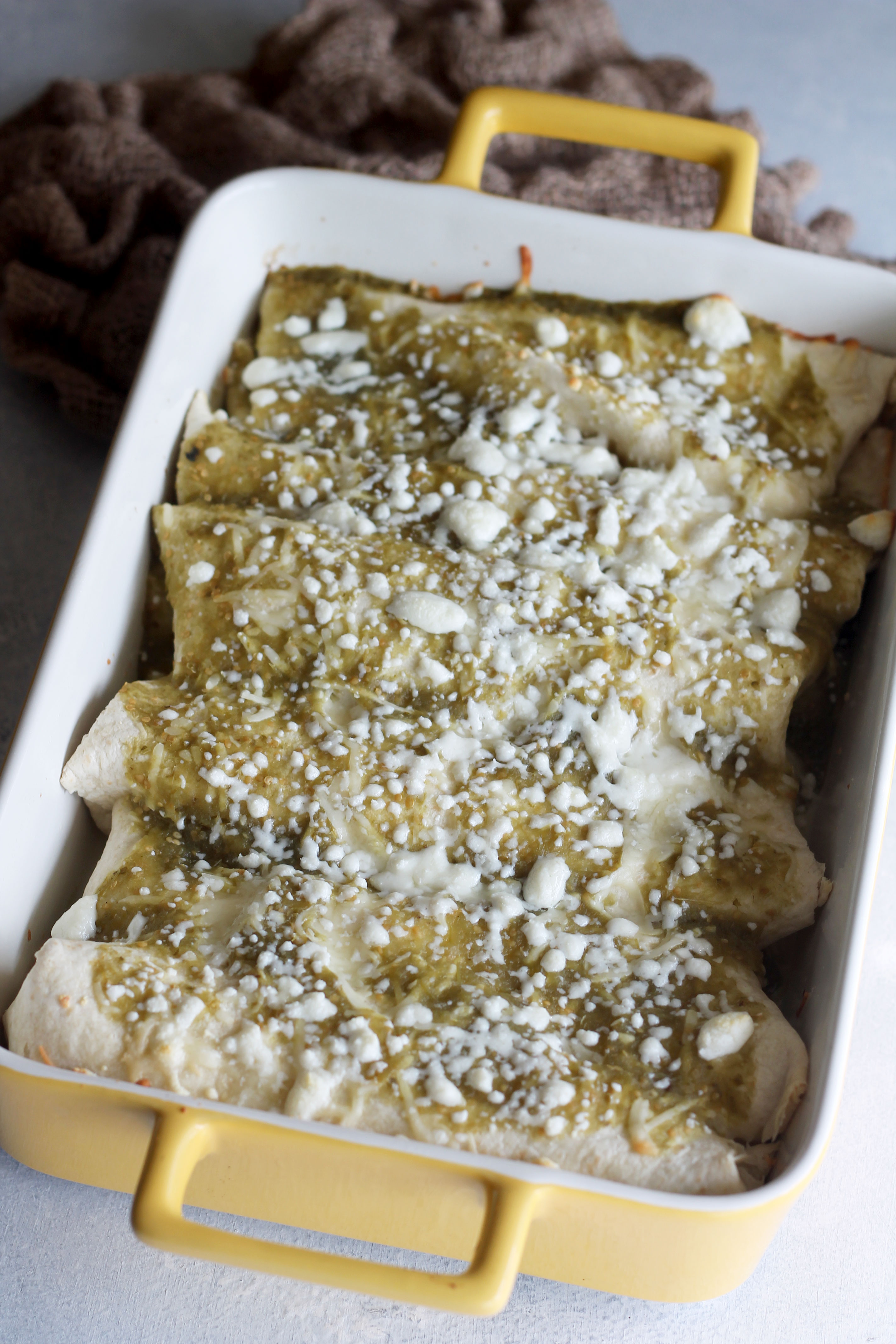 Skip going out to eat and stay in tonight to make these Creamy Chicken Enchiladas