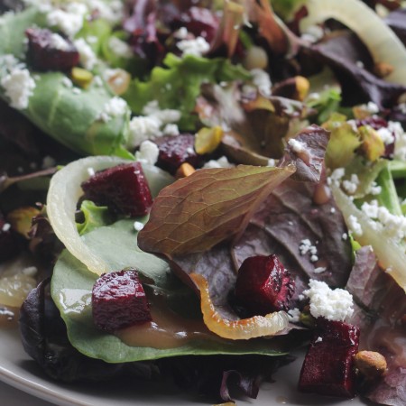 Mixed Greens with Roasted Beets, Caramelized Onions, Goat Cheese and Pistachios