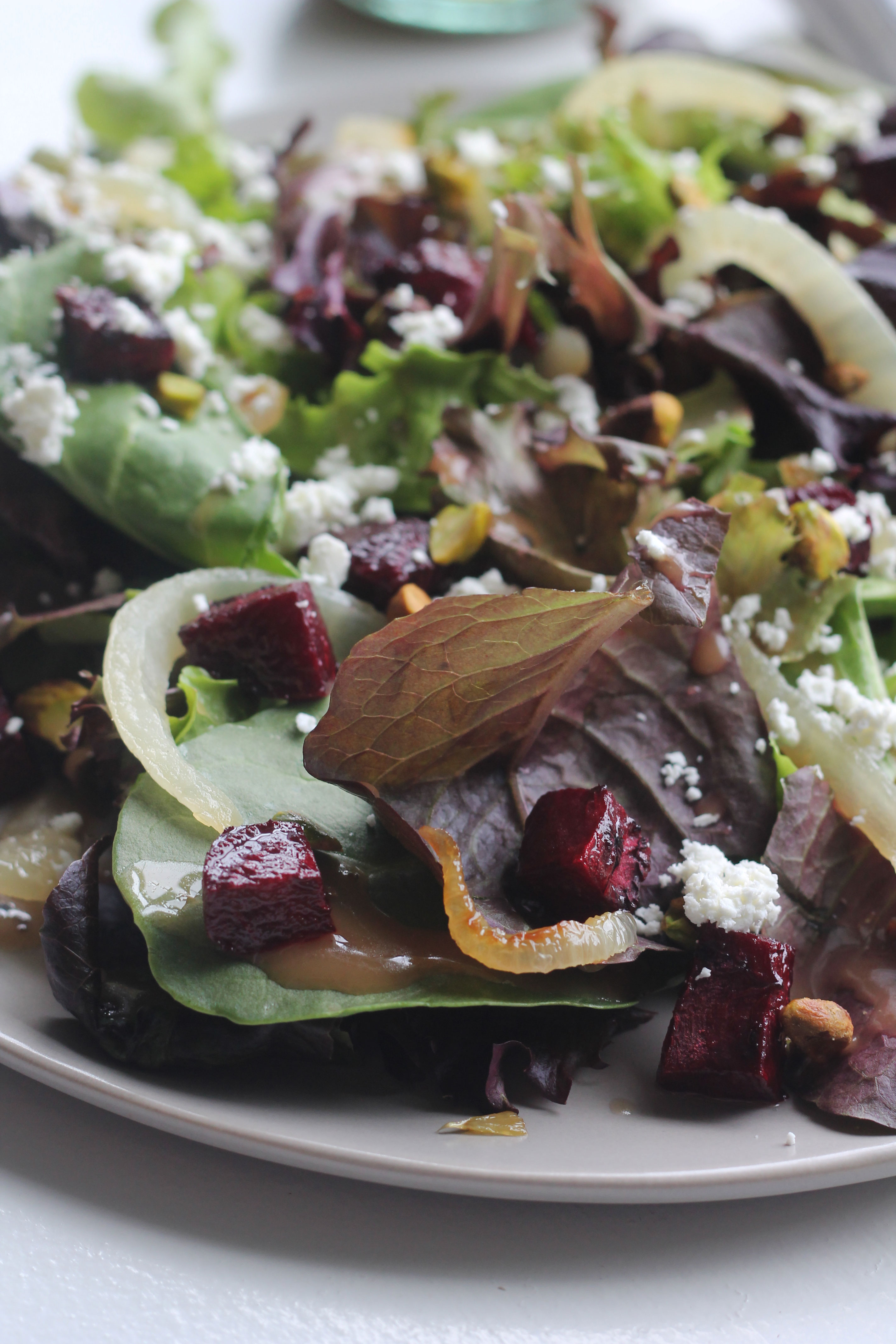 Mixed Greens with Roasted Beets, Caramelized Onions, Goat Cheese and Pistachios