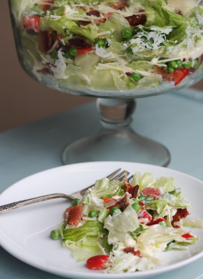Heading to a potluck or holiday get together? This Seven Layer Salad will be a crowd pleaser