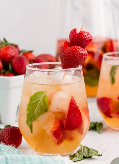 A glass of Strawberry and Basil Sangria.