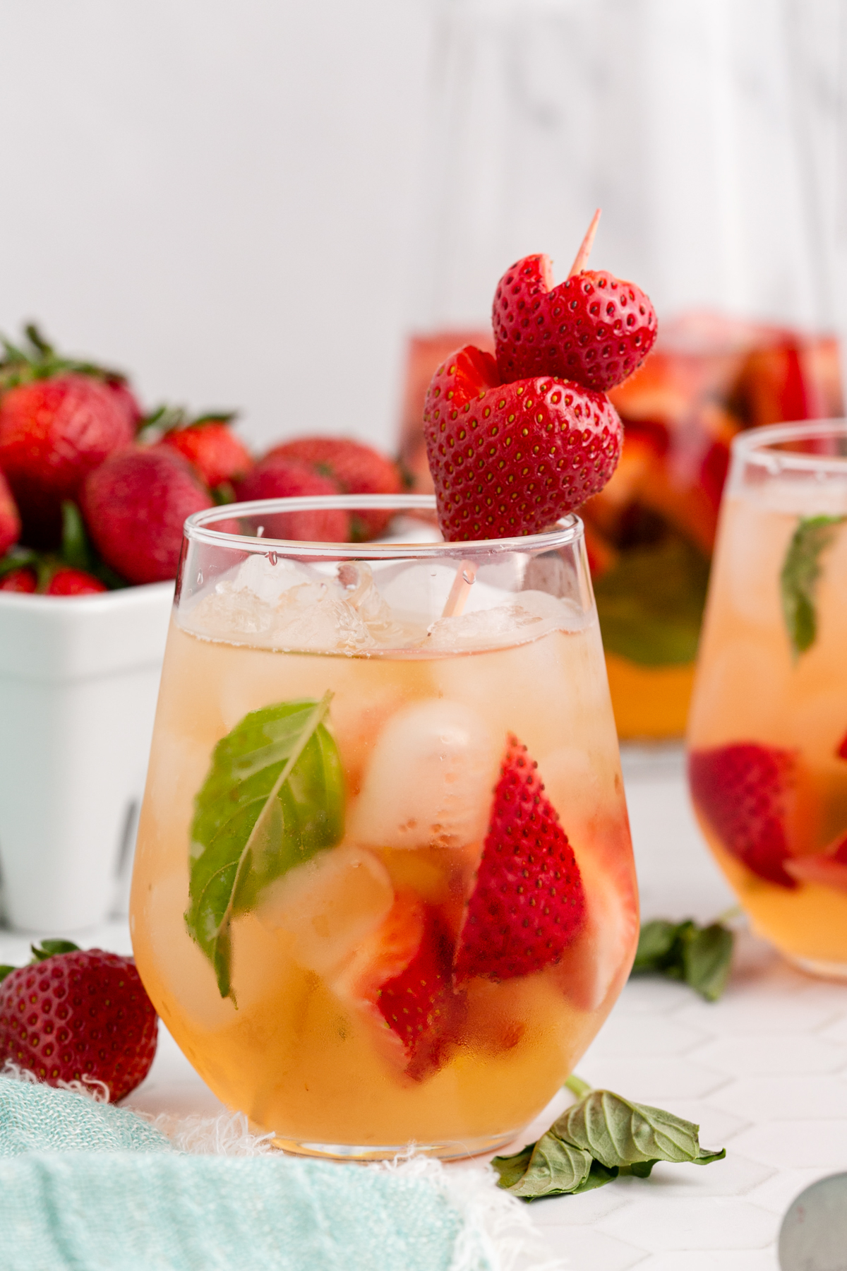 Make this colorful and fun refreshing Strawberry and Basil Sangria for your next summer party! Add in some white wine, and you have the perfect match It will be wonderful to serve at brunches and bridal parties, too. via @foodhussy