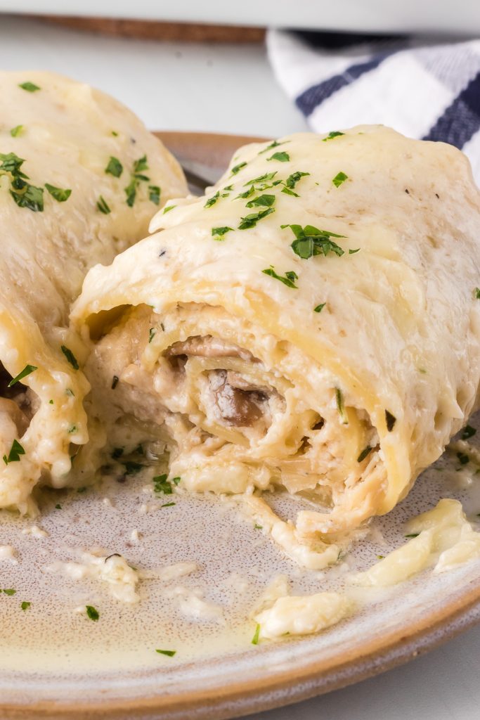 Chicken and mushrooms wrapped up in lasagna noodles.