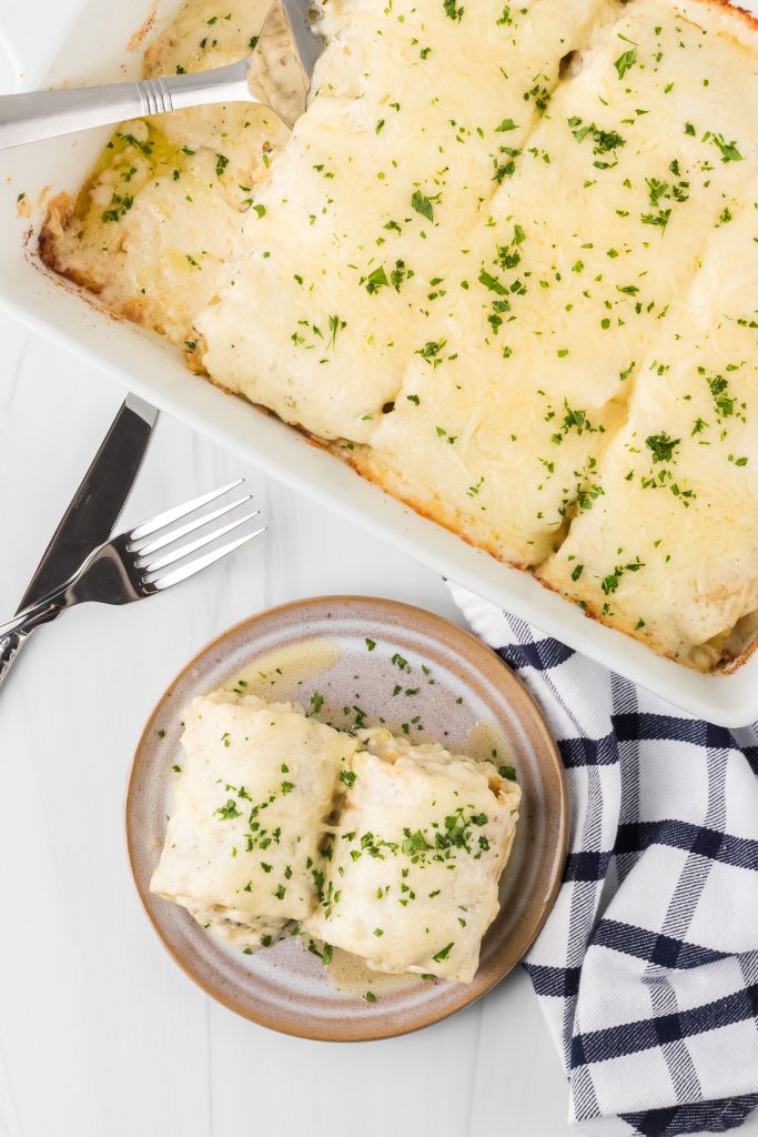 Lasagna rolls with chicken, mushrooms, and Alfredo sauce.