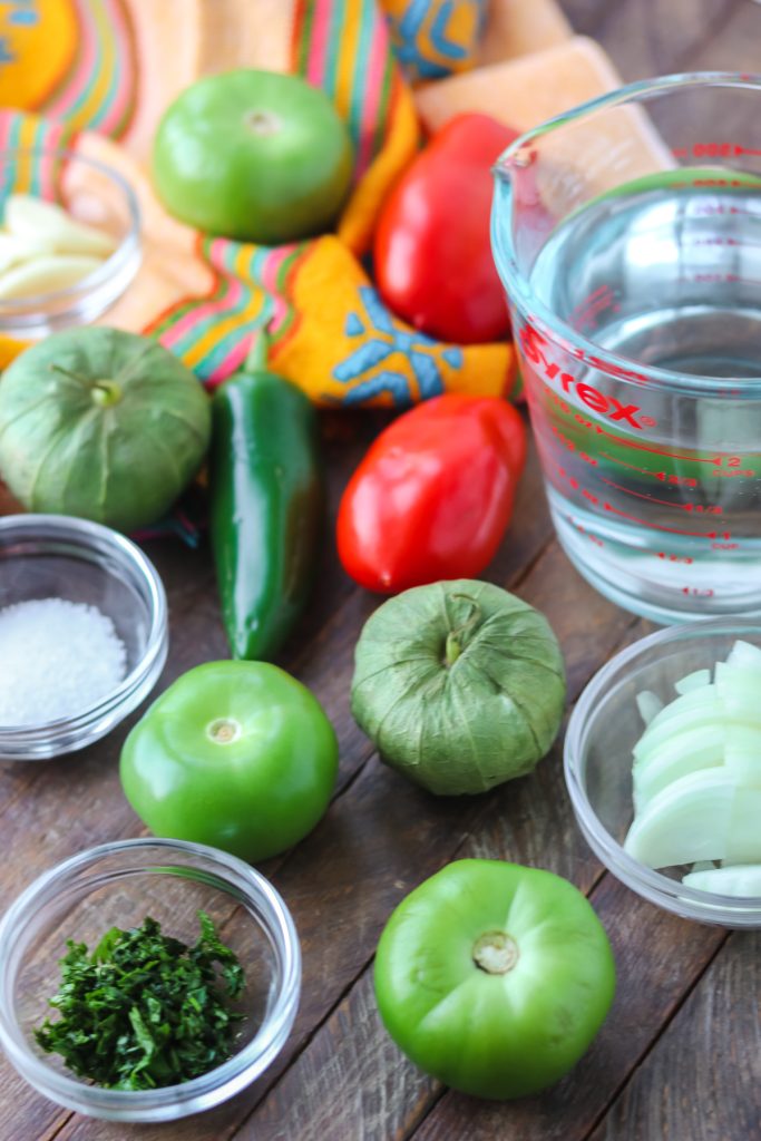 Ingredients to make fresh tomato salsa.