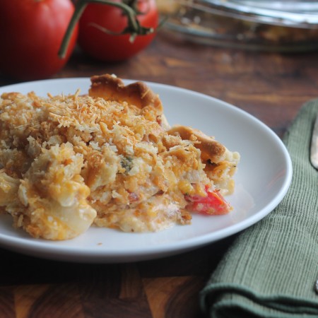 The Classic Southern Tomato Pie takes a little twist by adding caramelized onions and bacon!