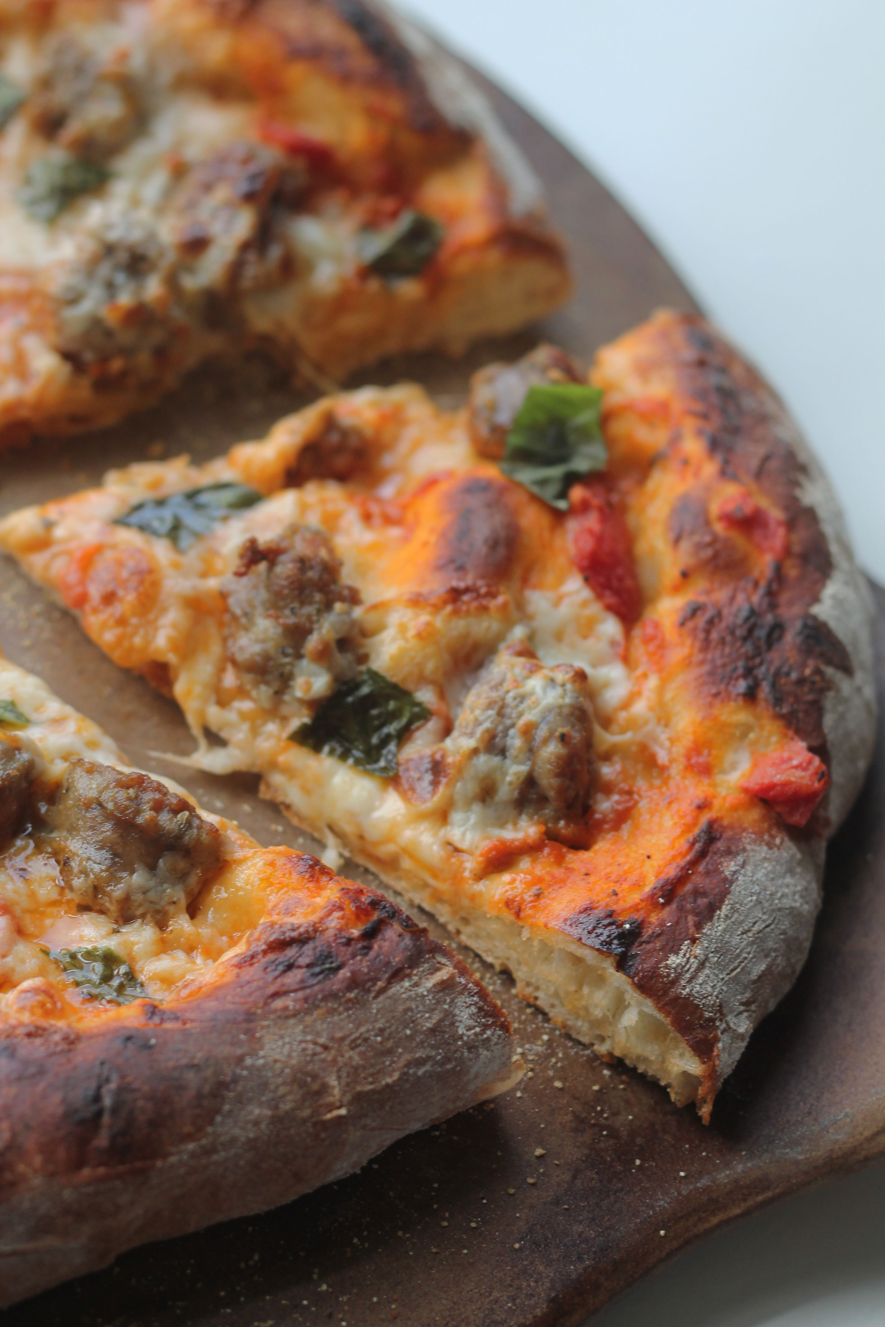 Creamy Vodka and Sausage Pizza recipe from Ken Forkish's The Elements of Pizza book