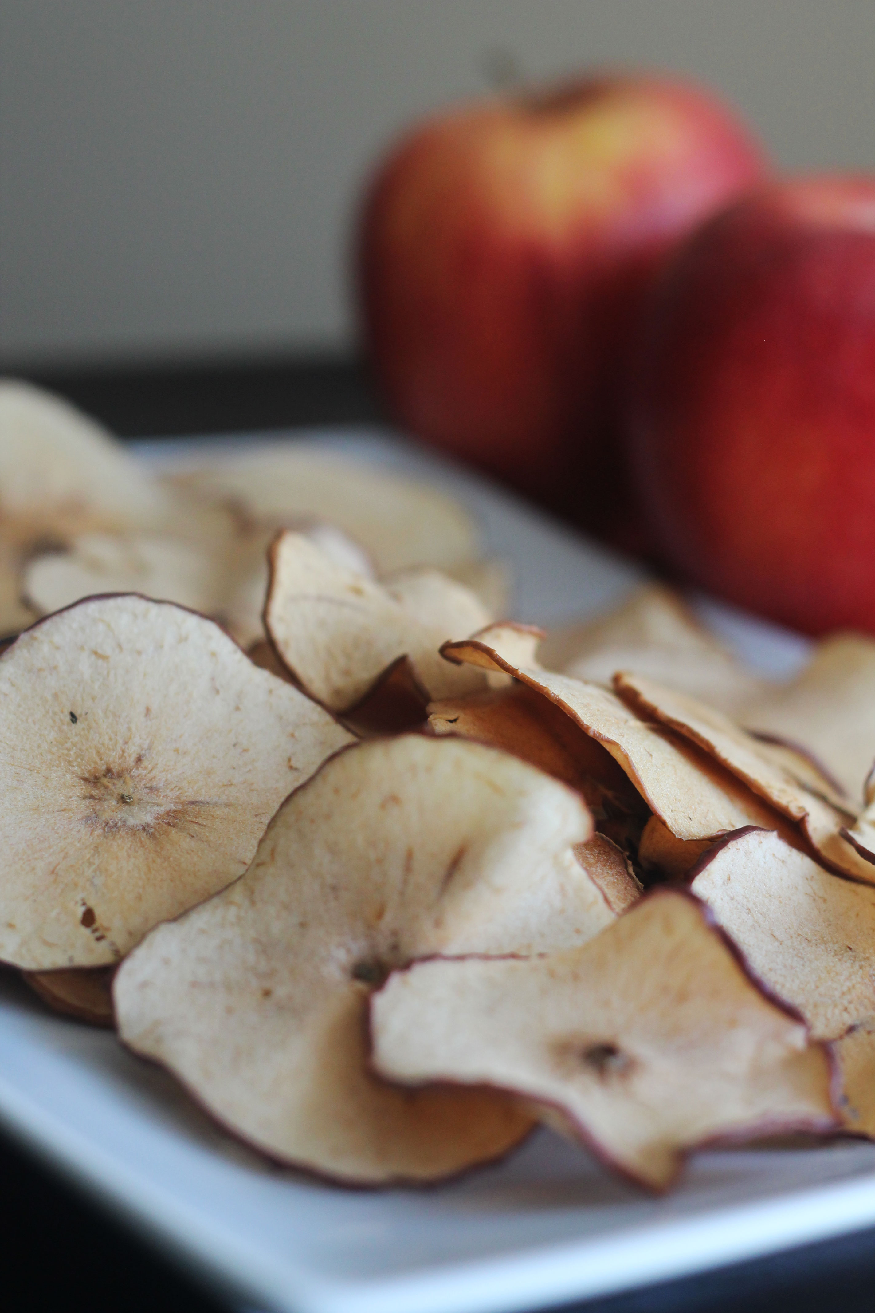 These Apple Chips could go in your oatmeal for breakfast, as a topping on a salad, an afternoon snack, or late night treat!