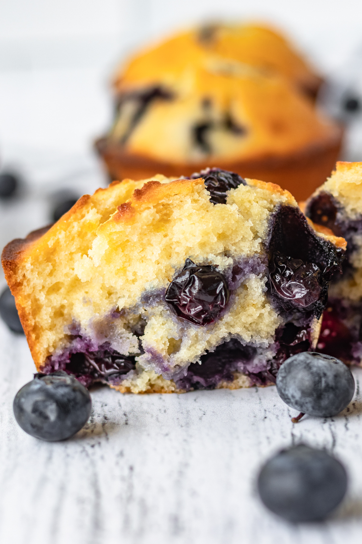 Fluffy, homemade Blueberry Muffins are easy to make with simple, fresh ingredients. Imagine golden-brown tops and a tender inside, where the sweet blueberries and a hint of vanilla come together. This easy recipe is perfect for a cozy breakfast or a tasty snack, making it a go-to for anyone who loves simple and delicious baking. via @foodhussy
