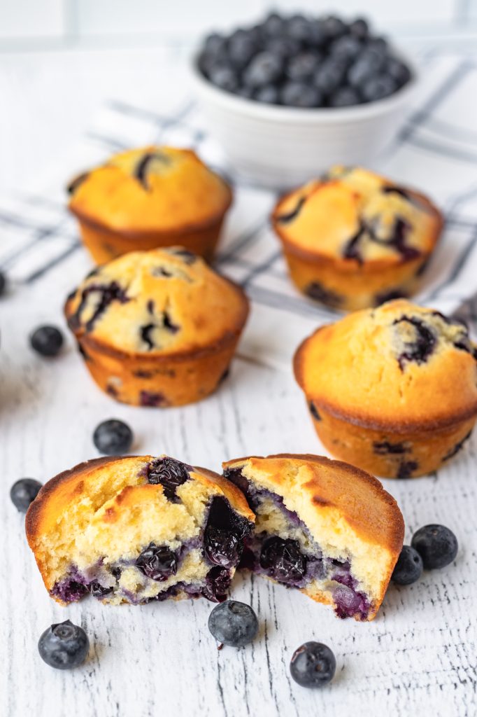 Muffins bursting with blueberries.