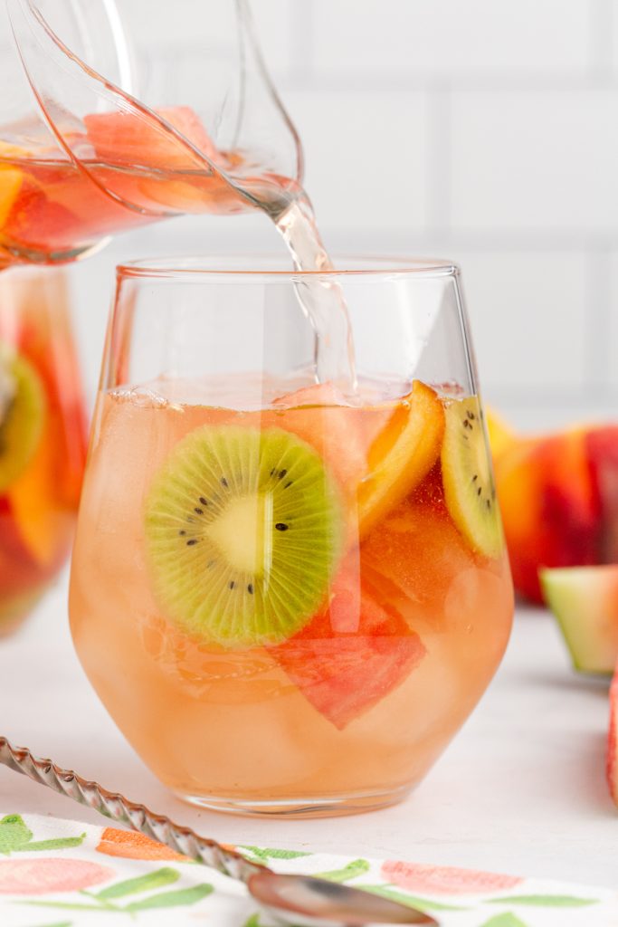 Rose wine, club soda and various summer fruits in an easy sangria.
