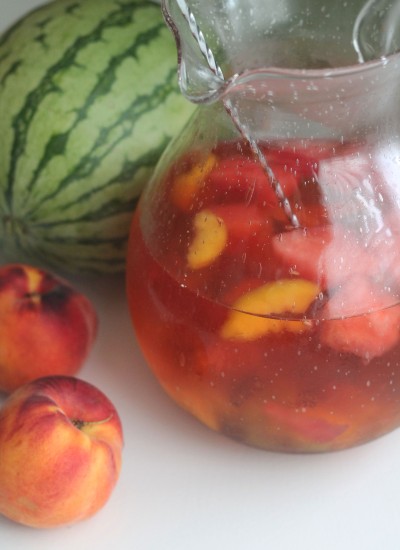 Summer Rose Sangria with watermelon, peaches and kiwi