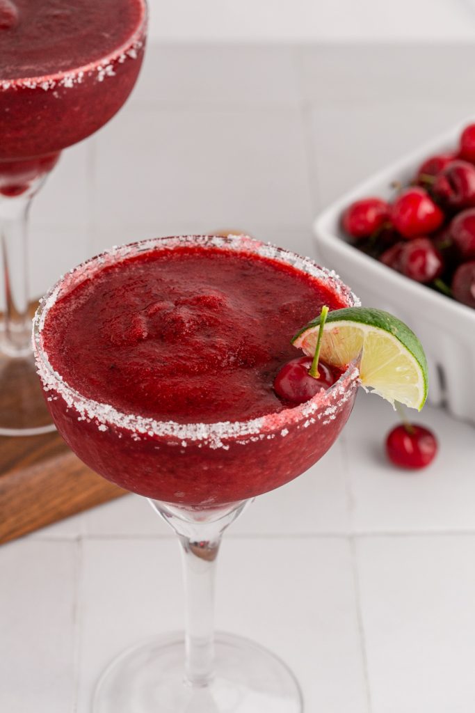 Cherries, liquor, and ice make these delicious frozen margaritas.