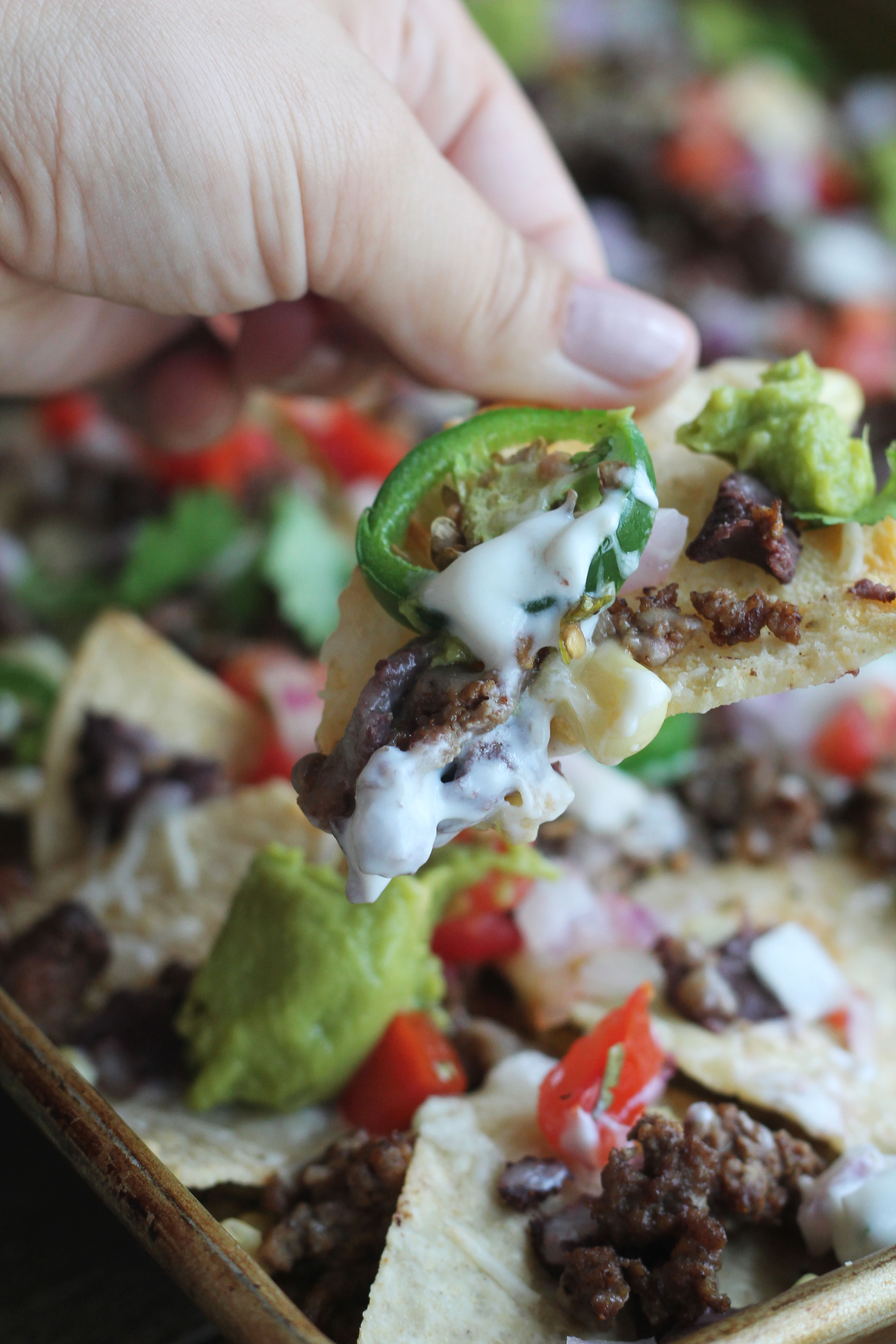 These Sheet Pan Beef Nachos are loaded with flavor