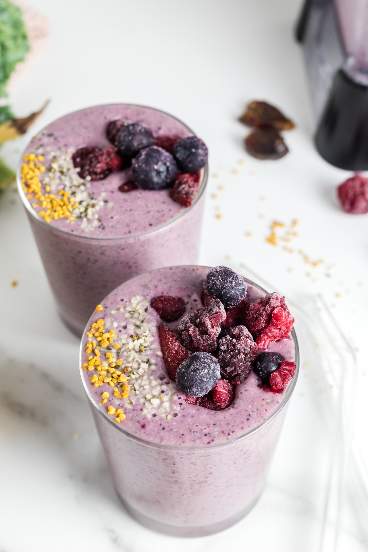 This Mixed Berry Smoothie combines frozen berries, bananas, vanilla Greek yogurt, and more for a healthy, refreshing breakfast! You won’t even taste the hidden greens in these frozen fruity smoothies! via @foodhussy