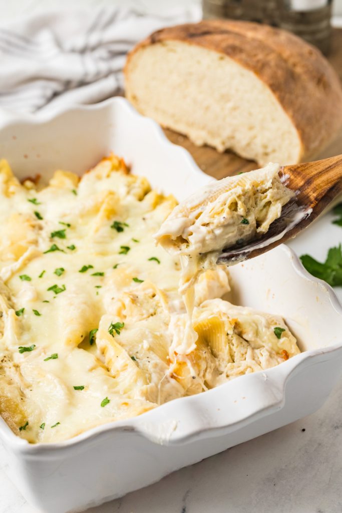 Serving shells stuffed with chicken, cheese and Alfredo sauce.