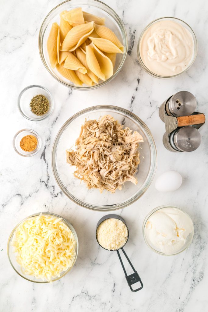 Ingredients for Cheesy Alfredo Stuffed Shells with Chicken.